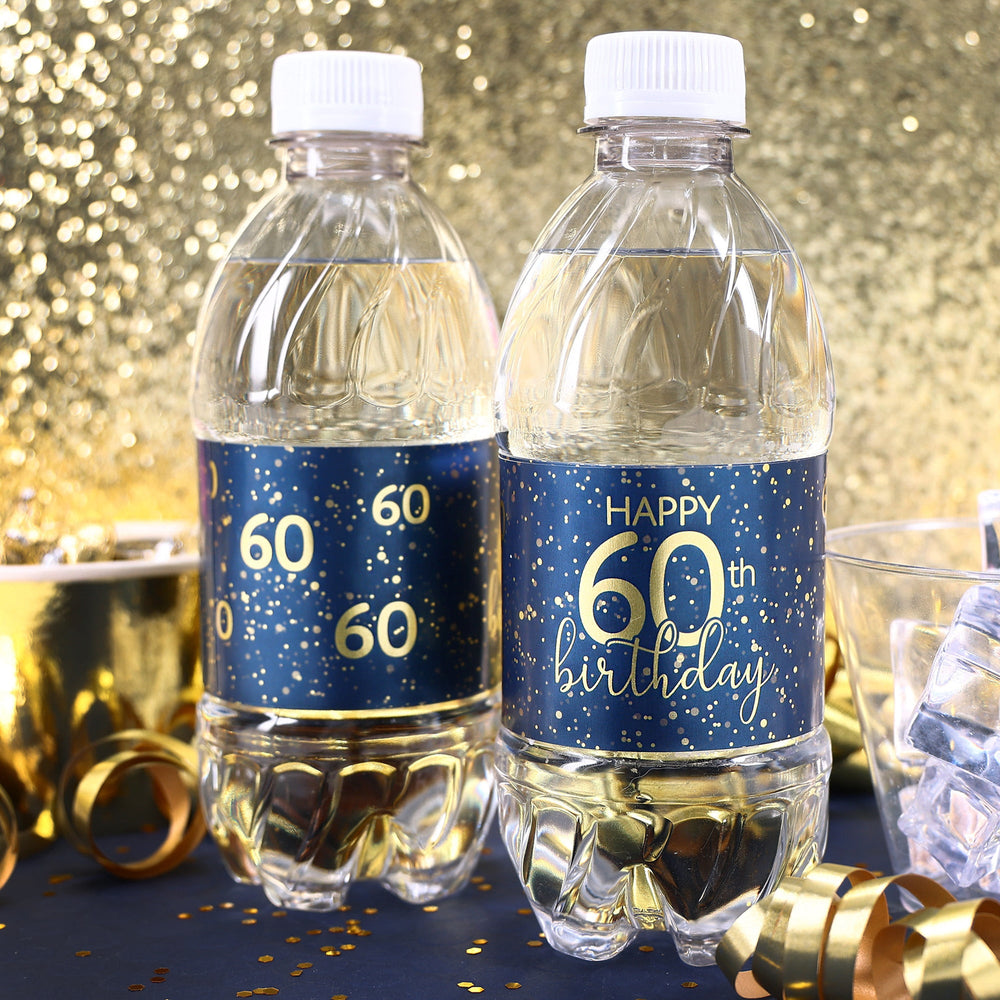 A close-up view of a navy blue water bottle label with gold lettering that reads "Happy 60th Birthday" and features a sleek, modern design