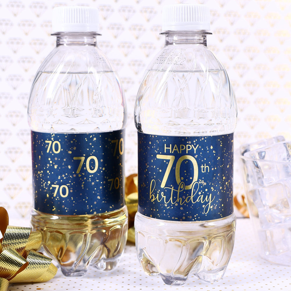 A close-up view of a navy blue water bottle label with gold lettering that reads "Happy 70th Birthday" and features a sleek, modern design