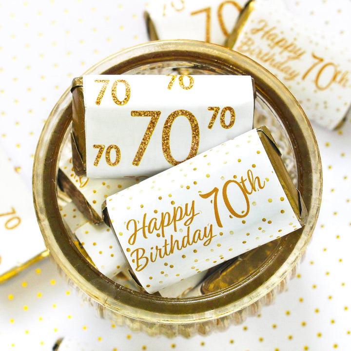 Treat your guests to the sweetest 70th birthday gift with these white and gold mini candy bar stickers